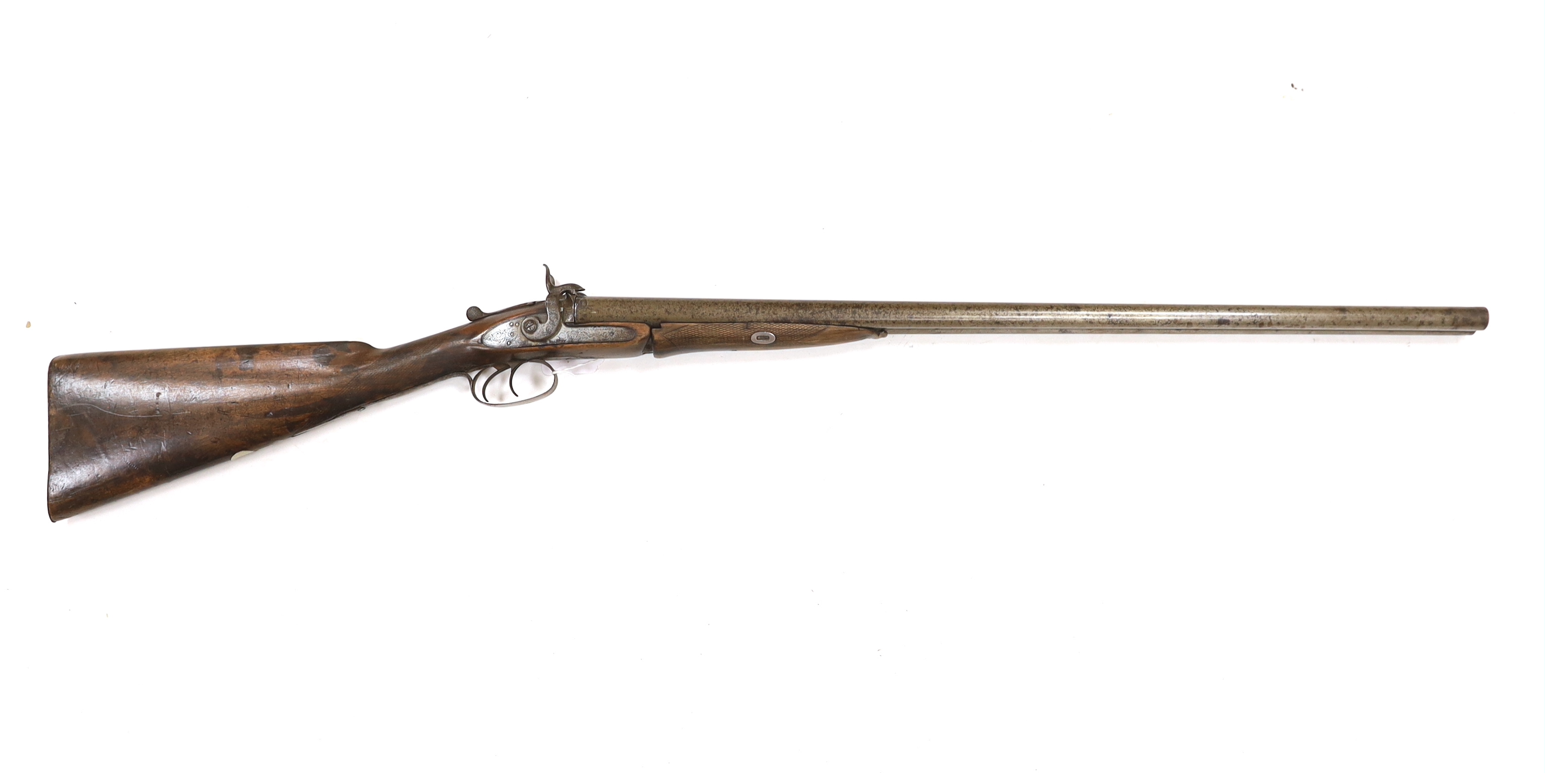 A double barrel pinfire shotgun by Wesley Richards with patent knuckle joint and top lever, barrels 74.5cm